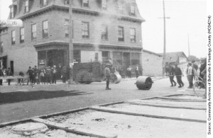 Paving Front Street at Bridge Street East in front of New Balmoral Hotel ca. August 1914  (HC04214)
