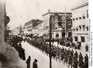 The 39th Battalion marches south down Front Street from Bridge Street East in 1915.