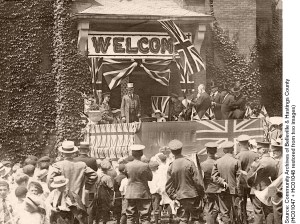 Edward Guss Porter is standing on the platform to the left in front of the Salvation Army Citadel on Pinnacle Street, Belleville.